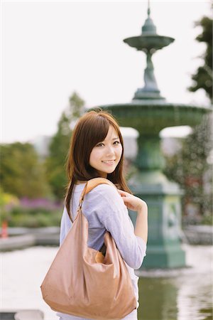 Japanese Women Posing With Bag Stock Photo - Rights-Managed, Code: 859-03885301