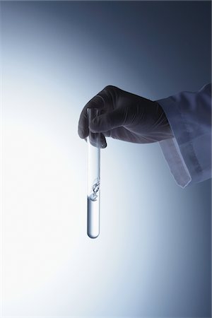 simsearch:6113-07589192,k - Scientist Holding Test Tube Stock Photo - Rights-Managed, Code: 859-03982255