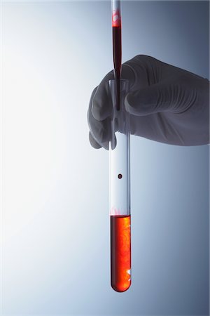 eye dropper - Scientist Holding Test Tube Stock Photo - Rights-Managed, Code: 859-03982263