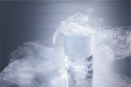 experimenting - Smoke Escaping From Flask Stock Photo - Rights-Managed, Code: 859-03982296