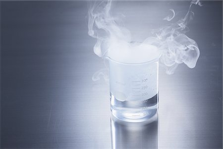 experimenting - Smoke Escaping From Flask Stock Photo - Rights-Managed, Code: 859-03982297