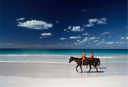 sea horse - Woman with guide going on horse ride,Pink Sand Beach,Harbour Island,Bahamas Stock Photo - Rights-Managed, Code: 851-02958764