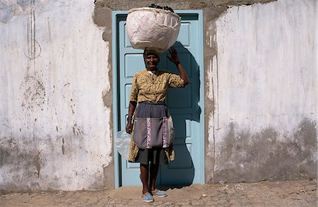 Woman balancing basket on head,Santo Antao Island,Cape Verde Islands Stock Photo - Rights-Managed, Code: 851-02959435