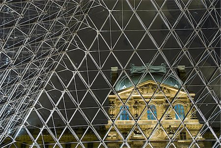 Looking out of the pyramid to the Louvre Museum at night,Paris,France Stock Photo - Rights-Managed, Code: 851-02959869