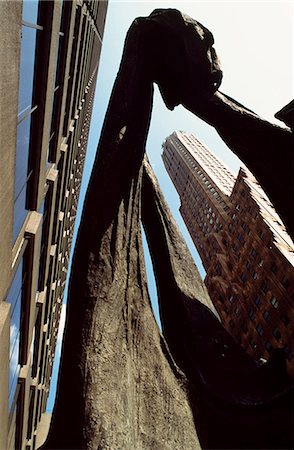 Dinoceras sculpture and General Electric Building in Midtown Manhattan,New York City,New York,USA Stock Photo - Rights-Managed, Code: 851-02964275