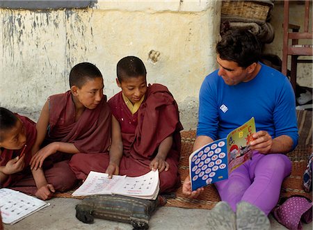 Man teaching young monks English,Phuktal Monastery,Zanskar,India Stock Photo - Rights-Managed, Code: 851-02960393