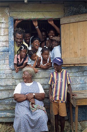 photography jamaica - family sticking out of house window,Hanover,Jamaica Stock Photo - Rights-Managed, Code: 851-02960931
