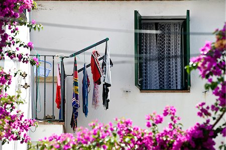 Washing drying on lines outside window,Cadaques,Girona,Catalonia,Spain Stock Photo - Rights-Managed, Code: 851-02963098