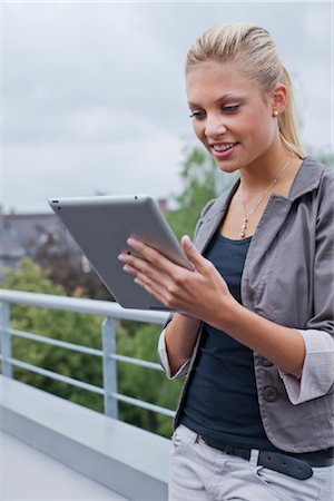 Young woman with ipad Stock Photo - Rights-Managed, Code: 853-05523580