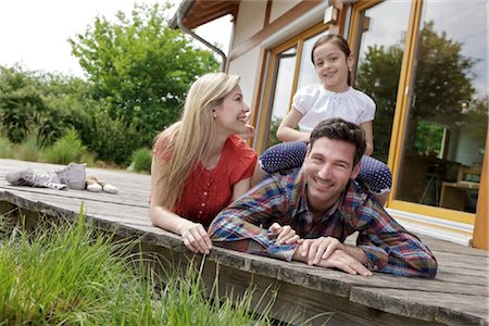 Family in front of Lehner energy house, Poing, Bavaria, Germany, Europe Stock Photo - Rights-Managed, Code: 853-05523874