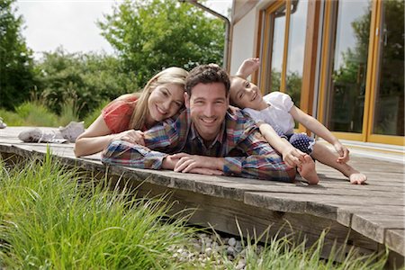 Family in front of Lehner energy house, Poing, Bavaria, Germany, Europe Stock Photo - Rights-Managed, Code: 853-05523886