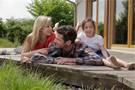 Family in front of Lehner energy house, Poing, Bavaria, Germany, Europe Stock Photo - Rights-Managed, Code: 853-05523881