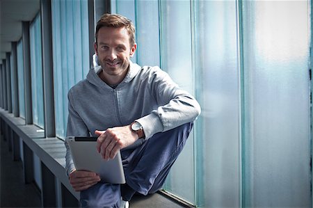 Man with ipad outdoors Stock Photo - Rights-Managed, Code: 853-06120386