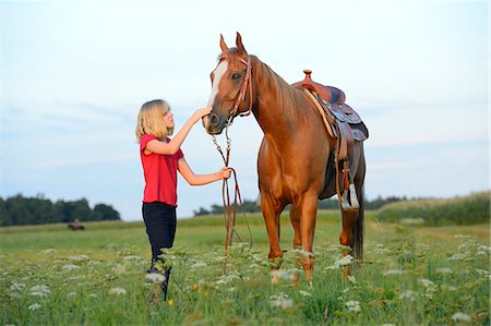 simsearch:853-06306120,k - Girl with horse on meadow Stock Photo - Rights-Managed, Code: 853-06306105