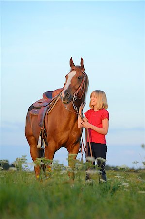simsearch:853-06306120,k - Girl with horse on meadow Stock Photo - Rights-Managed, Code: 853-06306106