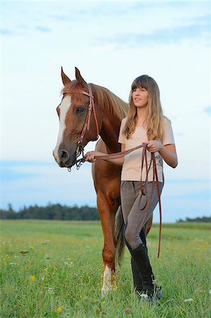 simsearch:853-06306120,k - Teenage girl with horse on meadow Stock Photo - Rights-Managed, Code: 853-06306110