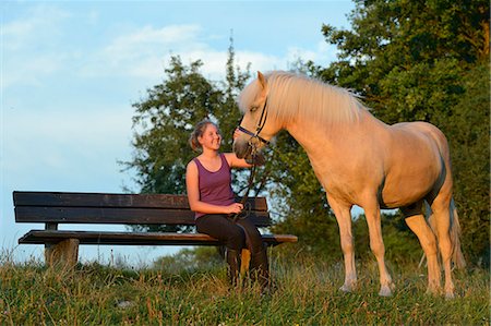 simsearch:853-06306120,k - Girl on bench with horse Stock Photo - Rights-Managed, Code: 853-06306128