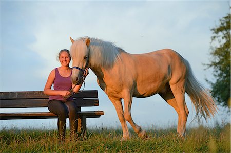 simsearch:853-06306120,k - Girl on bench with horse Stock Photo - Rights-Managed, Code: 853-06306129