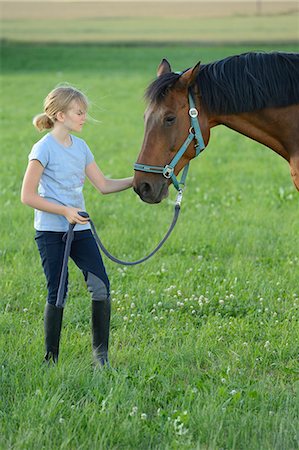simsearch:853-06306120,k - Girl with horse on meadow Stock Photo - Rights-Managed, Code: 853-06306141