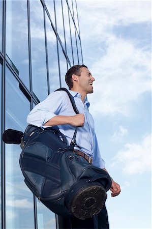 Man with golf bag Stock Photo - Rights-Managed, Code: 853-06441577