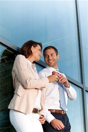simsearch:649-07238896,k - Businessman and businesswoman with coffee to go talking Stock Photo - Rights-Managed, Code: 853-06441661