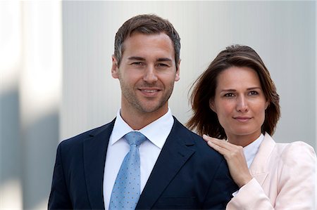 partner, concept - Businesswoman laying her hand on the shoulder of a businessman Stock Photo - Rights-Managed, Code: 853-06441693
