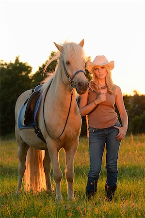 simsearch:853-06306120,k - Young woman with horse on meadow Stock Photo - Rights-Managed, Code: 853-06442120