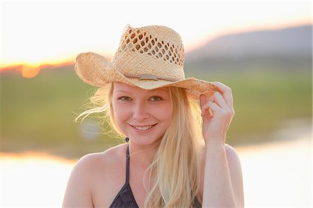 emotional happy - Young woman with a bikini and straw hat, portrait Stock Photo - Rights-Managed, Code: 853-07148650