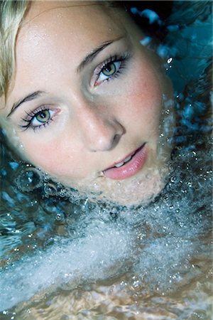 simsearch:853-02914470,k - Young woman in water looking at camera, portrait Stock Photo - Rights-Managed, Code: 853-02914110