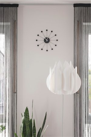 pot light - Clock and lamp in living room Stock Photo - Rights-Managed, Code: 853-02914168