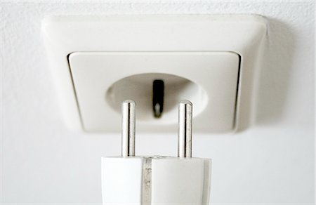 plug and a socket, close-up Stock Photo - Rights-Managed, Code: 853-02914708