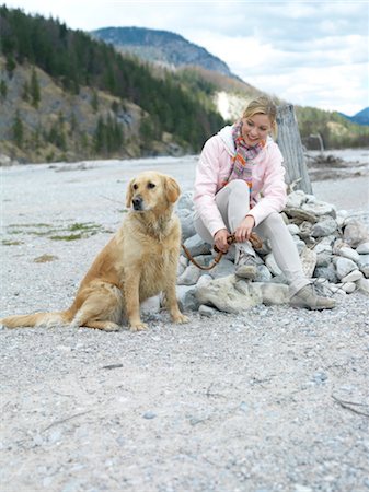 Woman with dog at lake Stock Photo - Rights-Managed, Code: 853-02913774