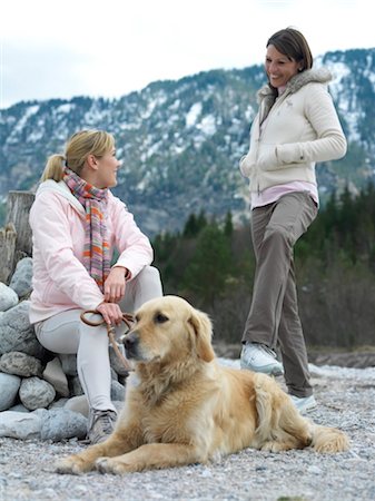Two women with dog at lake Stock Photo - Rights-Managed, Code: 853-02913777