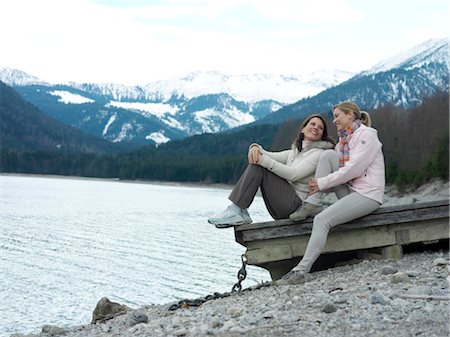 strolling - Two women sitting at lake Stock Photo - Rights-Managed, Code: 853-02913788