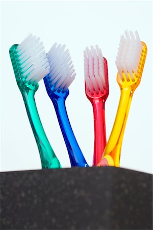 focus concept - Close-up of toothbrushes in holder Stock Photo - Rights-Managed, Code: 853-03227779