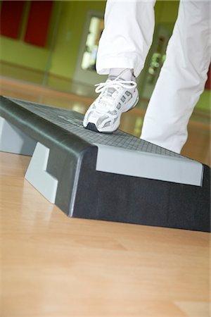 simsearch:853-03616708,k - Woman exercising on stepper, close-up Stock Photo - Rights-Managed, Code: 853-03616727