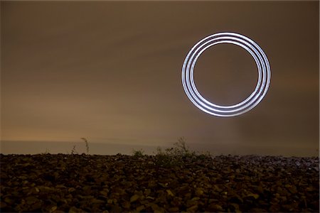 space art - Illuminated circle at sky, Oberhausen, North Rhine-Westphalia, Germany, Europe Stock Photo - Rights-Managed, Code: 853-03616769