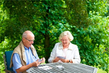 senior couple garden - Senior couple playing cards on the terrace Stock Photo - Rights-Managed, Code: 853-03617003