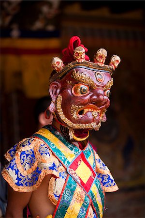simsearch:841-05845843,k - A masked dancer at the Tamshingphala Choepa festival in Bumthang. Stock Photo - Rights-Managed, Code: 862-05996987