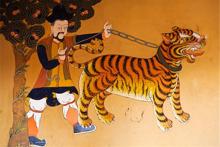 peint - Une peinture murale au 17ème siècle le Dzong de Paro, un des dzongs de plus impressionnants et les plus connus du Bhoutan. Photographie de stock - Rights-Managed, Code: 862-05997060