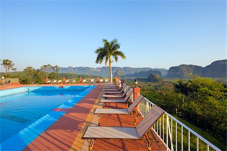 palm - The Caribbean, West Indies, Cuba, Vinales Valley, Unesco World Heritage Site, swimming pool at Hotel Los Jazmines Stock Photo - Rights-Managed, Code: 862-05997411