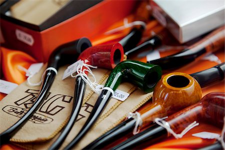 Italy, Tuscany, Lucca. Different types of pipes on display at a tobacconist Stock Photo - Rights-Managed, Code: 862-05997973