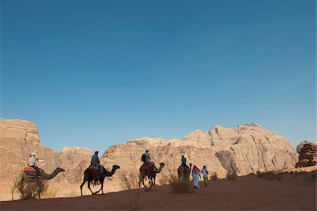 Camel Riding in the Wadi Rum, Jordan Stock Photo - Rights-Managed, Code: 862-05998291