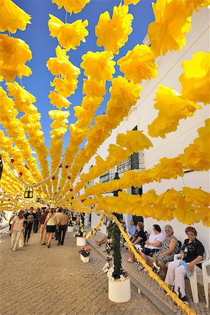 portugal people and culture - Streets decorated with paper flowers. People festivities (Festas do Povo). Campo Maior, Portugal Stock Photo - Rights-Managed, Code: 862-05998851