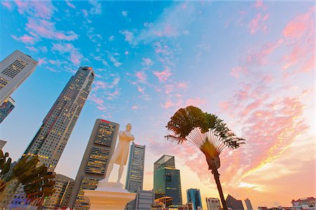 singapore - Singapore, Singapore City, Raffles statue and financial center behind at dusk Stock Photo - Rights-Managed, Code: 862-05999149