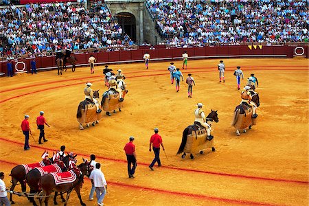 Spain, Andalusia, Seville; The participants of a bull-fight presenting themselves in the arena Stock Photo - Rights-Managed, Code: 862-05999158