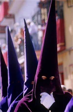 simsearch:841-06807735,k - Spain, Andalusia, Seville. Nazarenos during Semana Santa processions Stock Photo - Rights-Managed, Code: 862-05999310