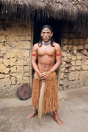 simsearch:862-06540983,k - Brazil, Bahia, Porto Seguro, Pataxo indigenous boy holding a wooden sword in the Jaqueira Pataxo Reservation Photographie de stock - Rights-Managed, Code: 862-06540805