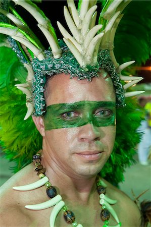 simsearch:862-06540939,k - South America, Brazil, Maranhao, Sao Luis, a costumed dancer in a headdress at the Bumba Meu Boi festival in the Praca Aragao Stock Photo - Rights-Managed, Code: 862-06540897