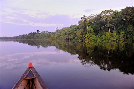 Boat on the Lago de Tarapoto, Amazon River, near Puerto Narino, Colombia Stock Photo - Rights-Managed, Code: 862-06541024